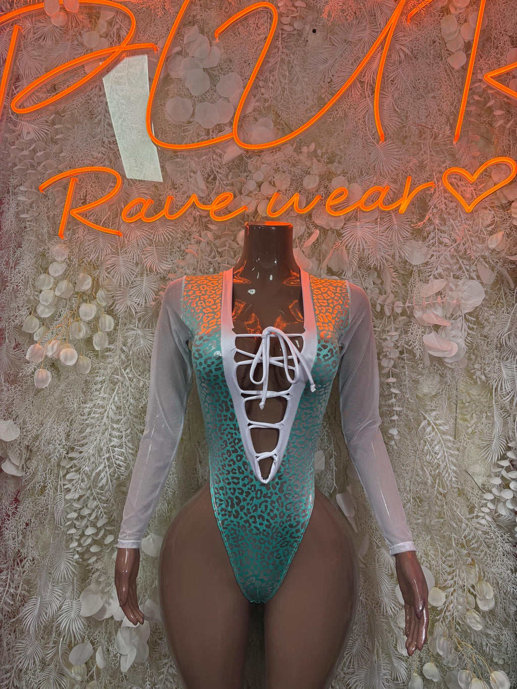 Aqua cheetah-print bodysuit with long sleeves and lace-up V-neck front