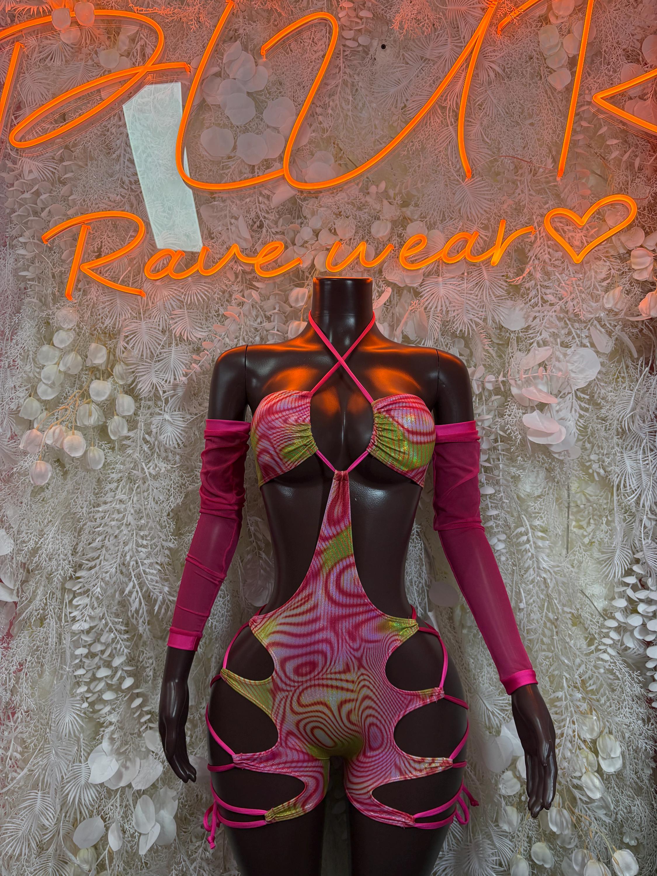 Pink metallic hologram rave dancewear bodysuit with cutouts, long sleeves, strappy front