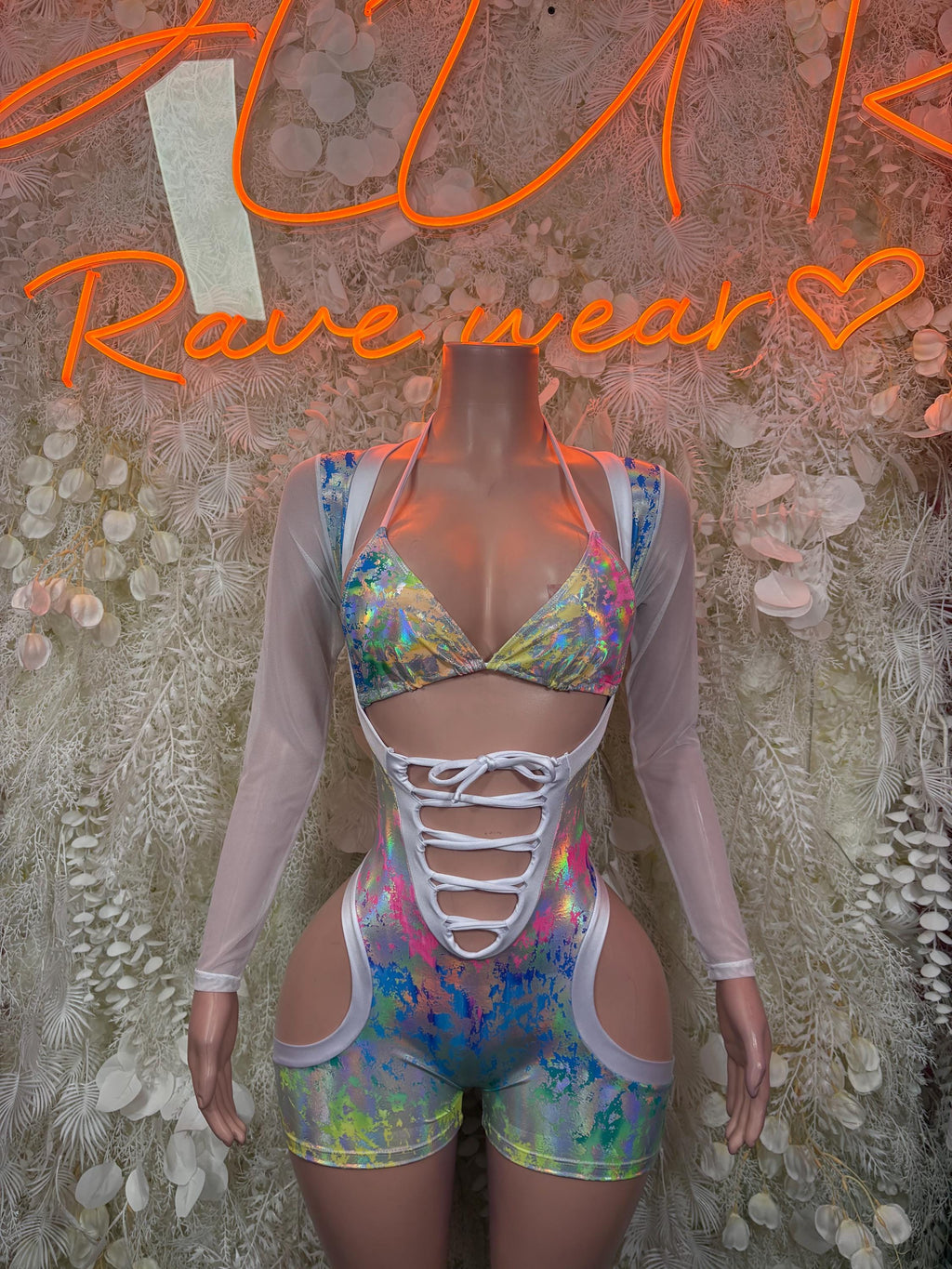 Rainbow hologram dance romper with lace-up front cutouts and matching sheer sleeve cover