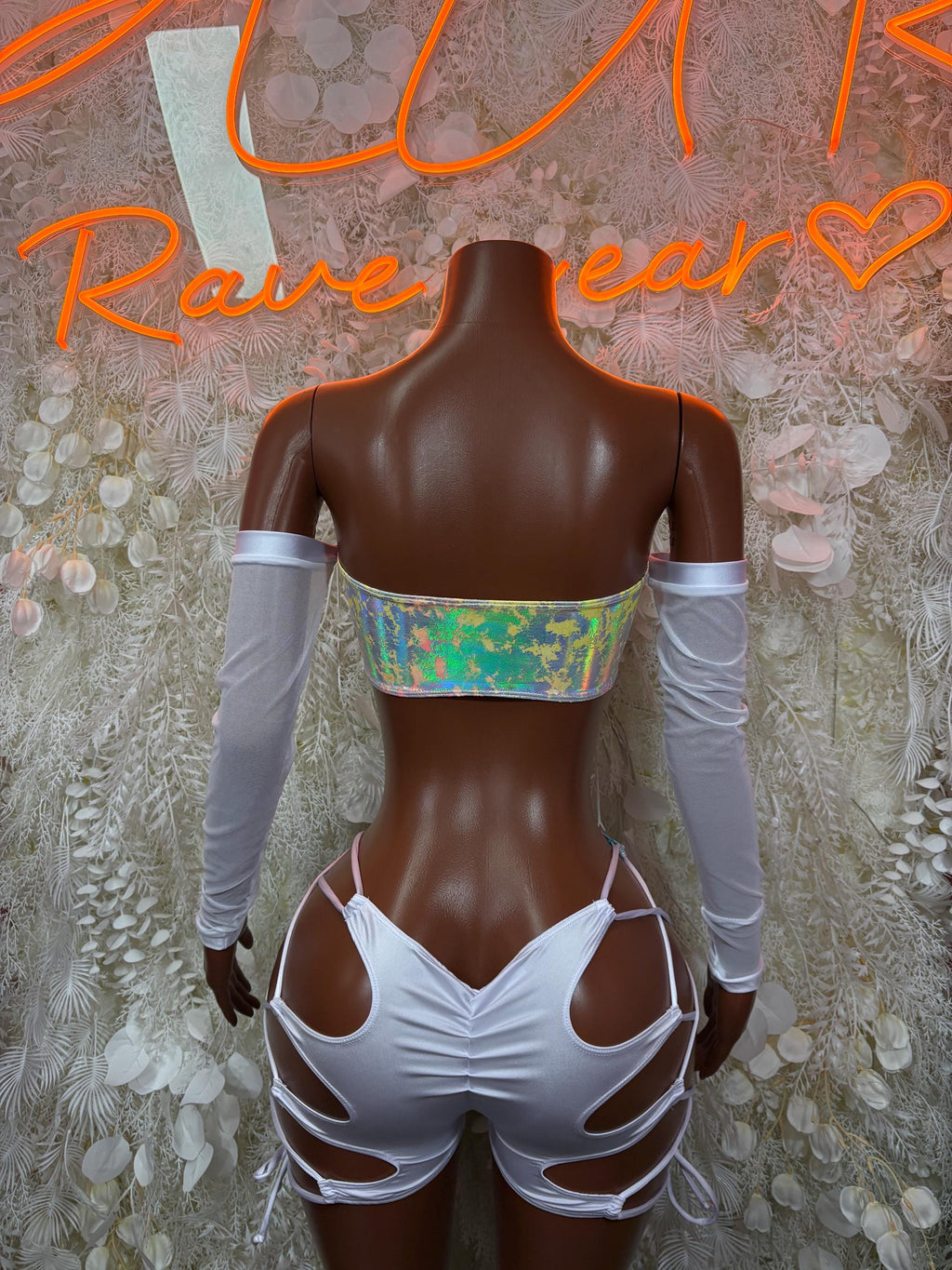 Rainbow hologram dance bodysuit back view with white off-shoulder sleeves and tie waist