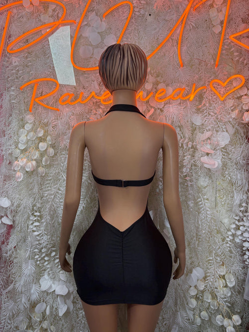 Black backless mini dress with cross straps and central waist cutout