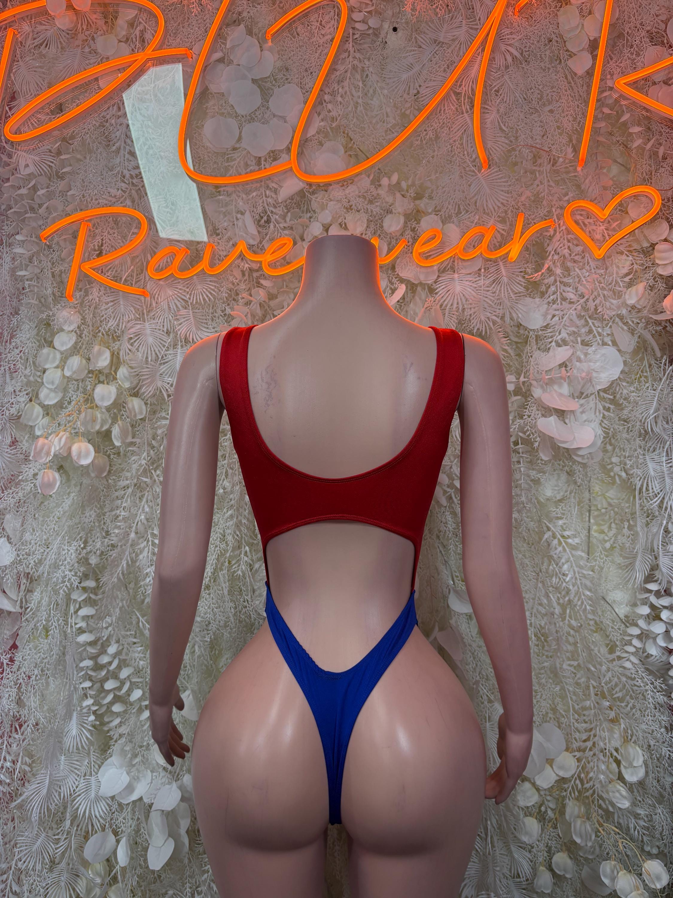 Red scoop-neck one-piece swimsuit top with blue high-leg bottom