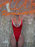 Red one-piece bodysuit with white trim and neck choker