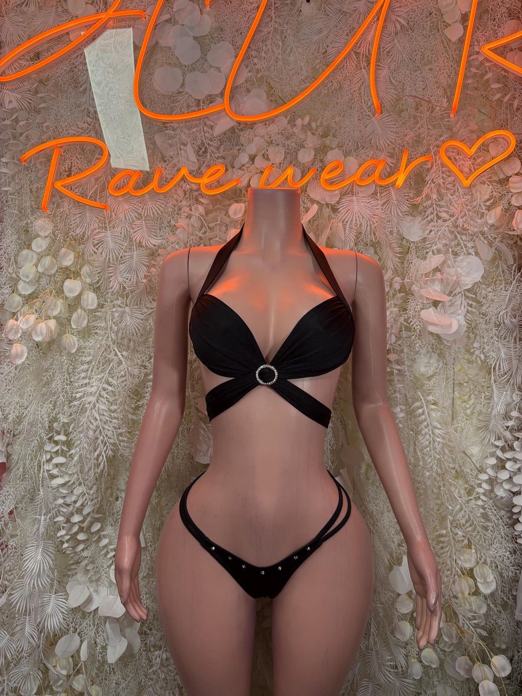 Black halter cutout bodysuit with ring center detail and matching bottoms
