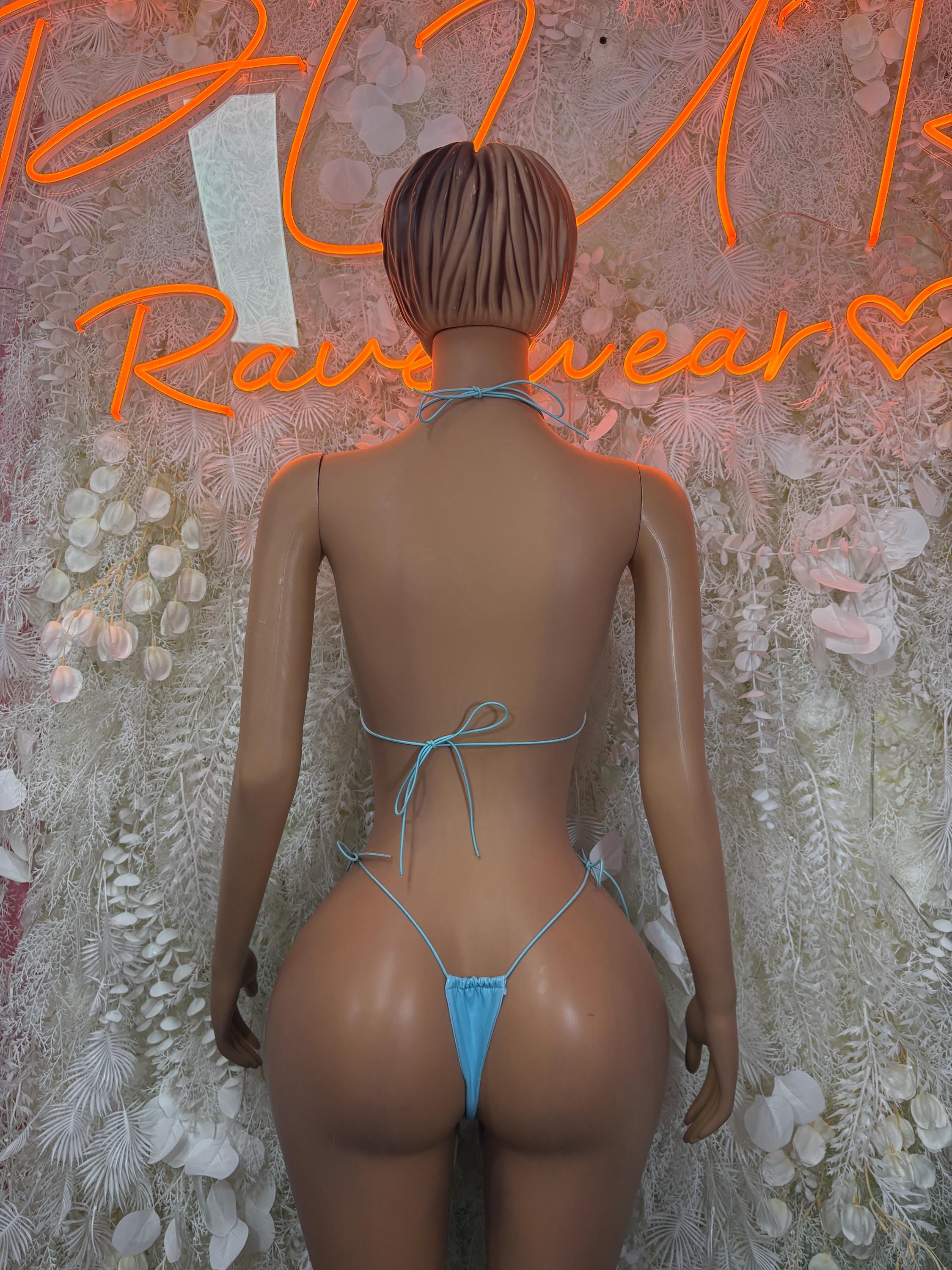 Teal bikini set shown from back, tie-string top and tie-back thong bottoms