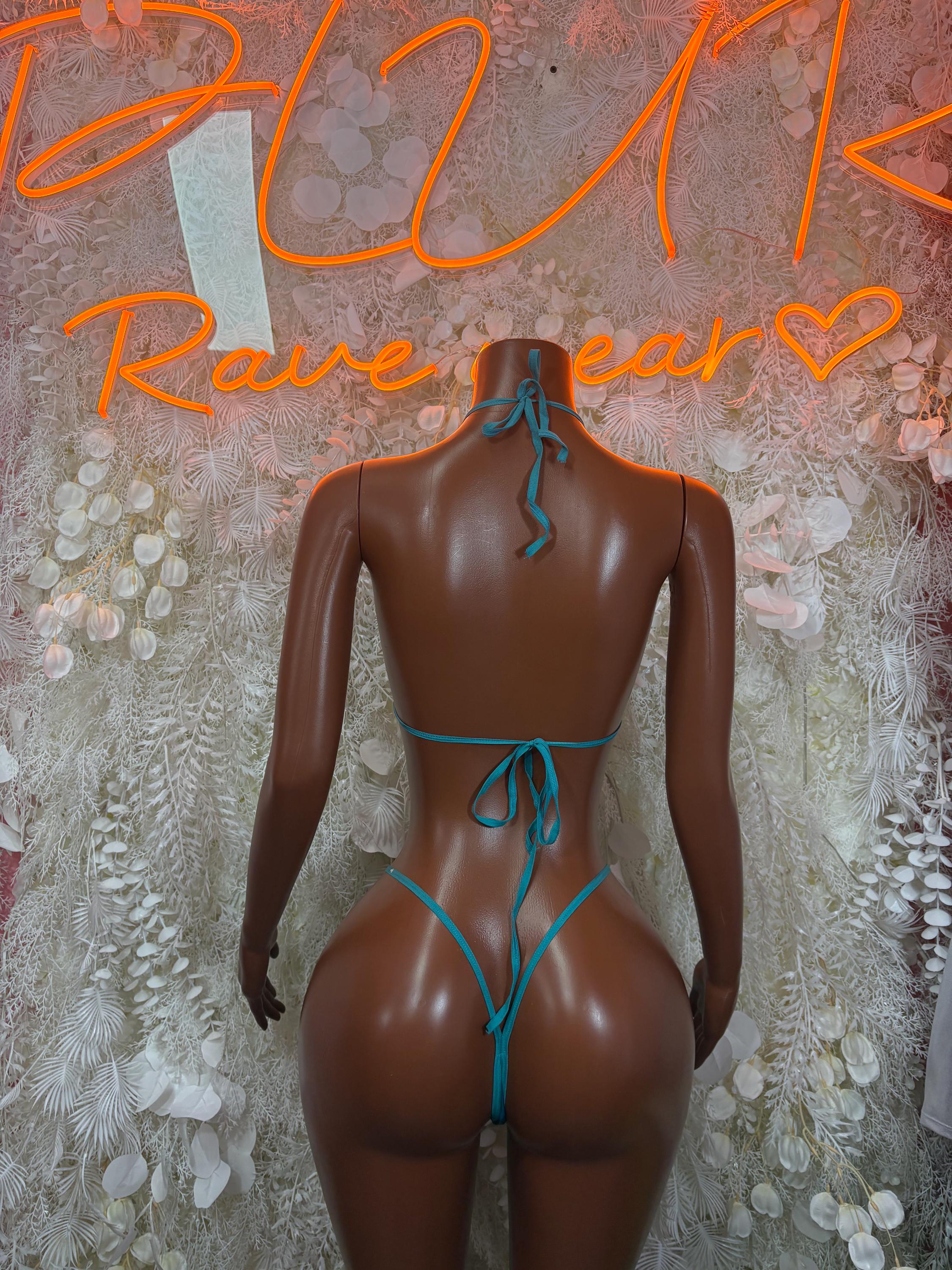 Blue metallic bikini set back view with halter neck tie and string bikini bottoms