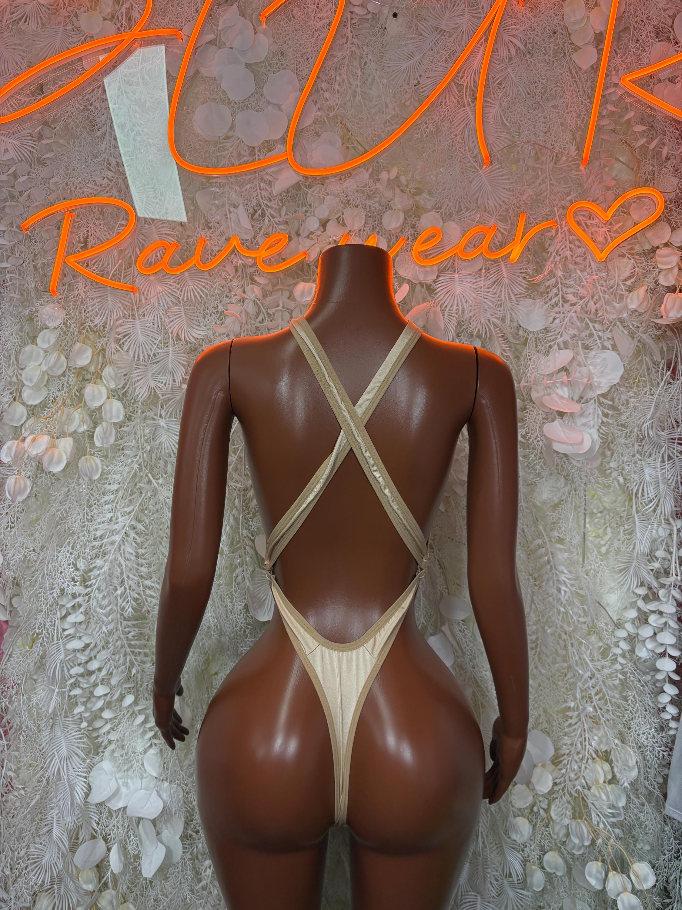 Nude sheer backless bodysuit with X-back straps and thong back