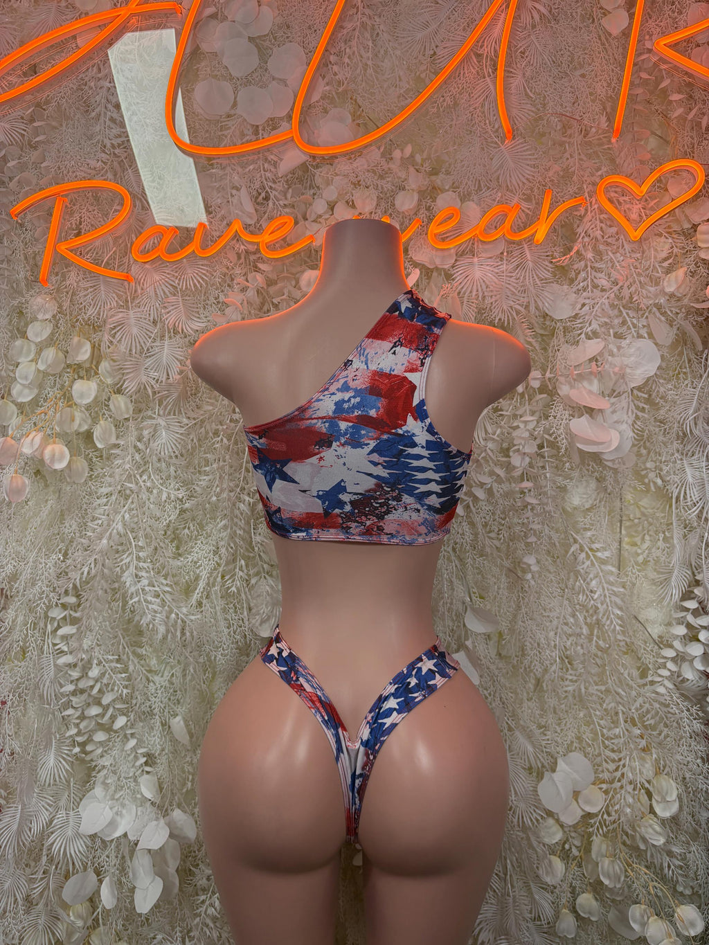 Star-and-stripe swimsuit with high-cut leg bottom and open back straps