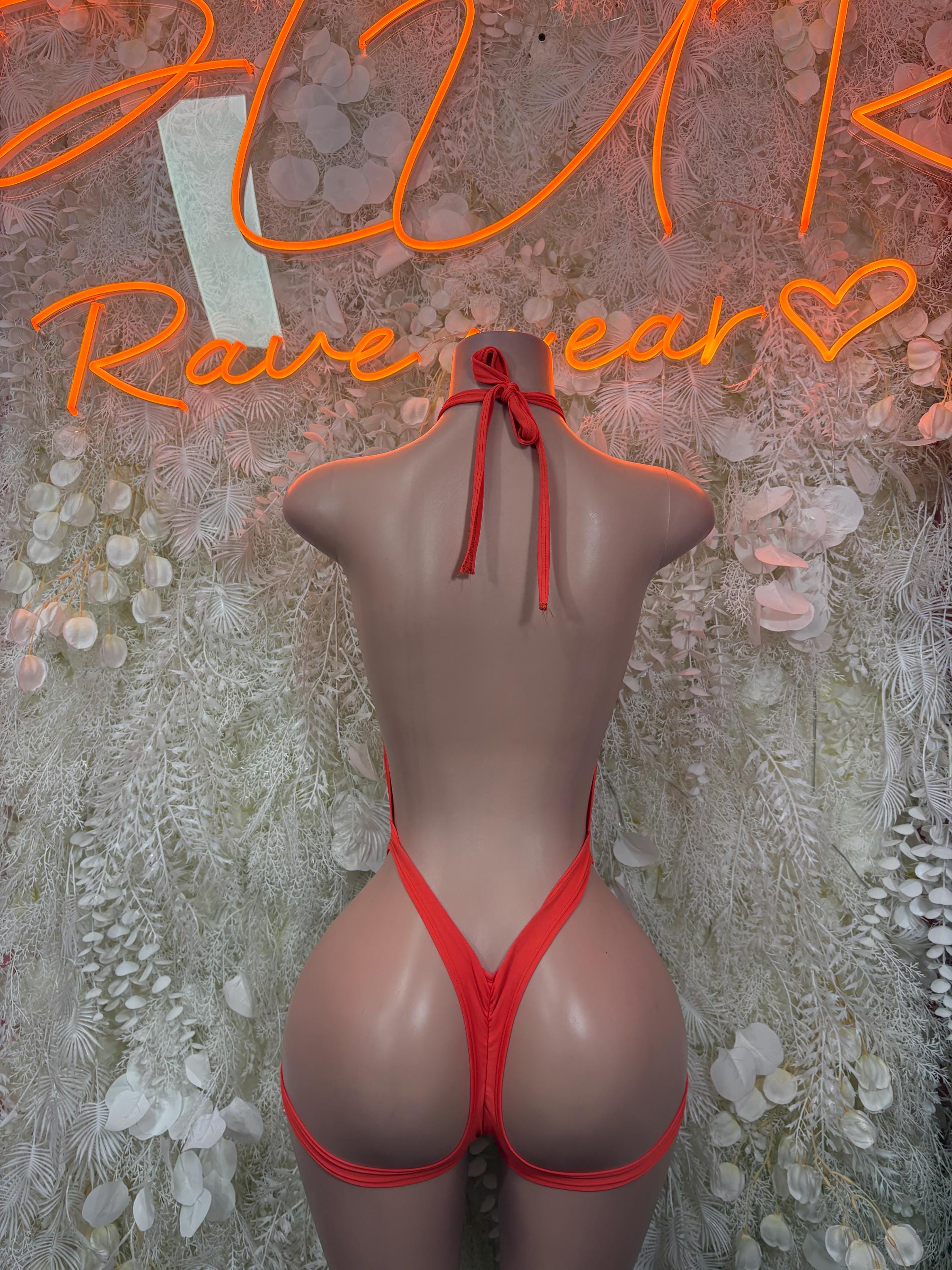 One-piece bodysuit back view, red with crisscross straps and tie neck