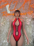 Red halter bodysuit with black trim and teardrop cutout front