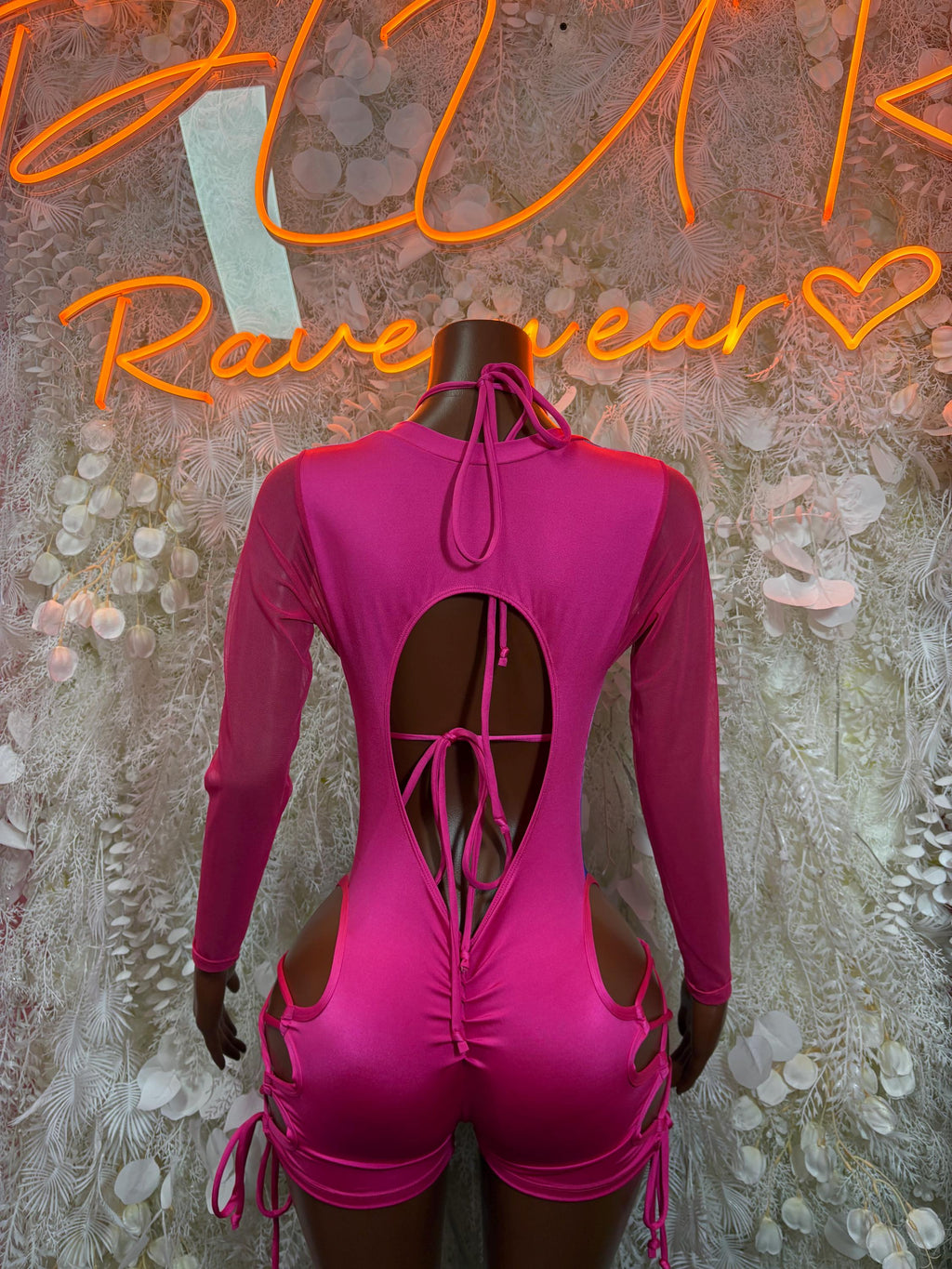 Rave bodysuit set back view: magenta long-sleeve top with open back ties