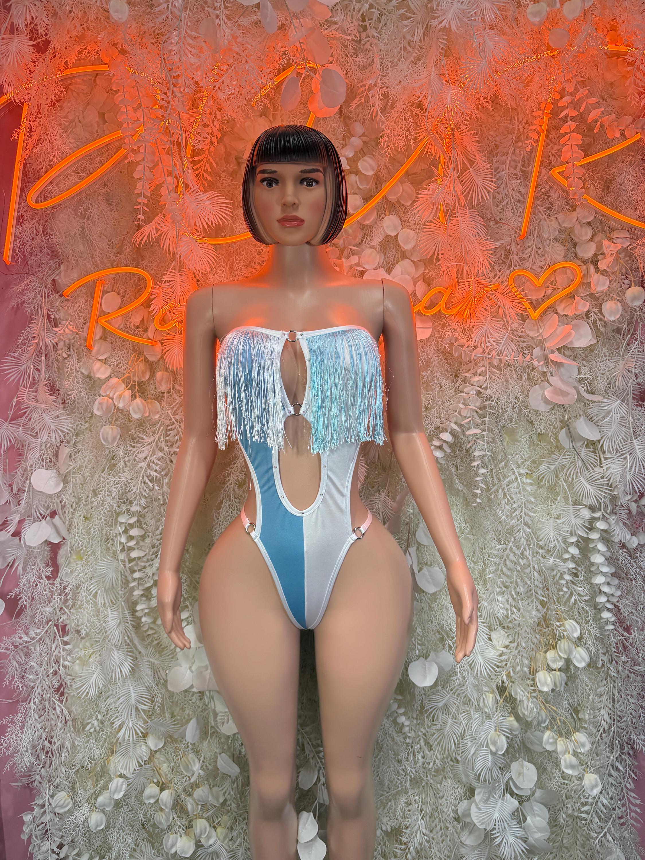 Light-blue one-piece swimsuit with white tassel trim and strapless sweetheart neckline