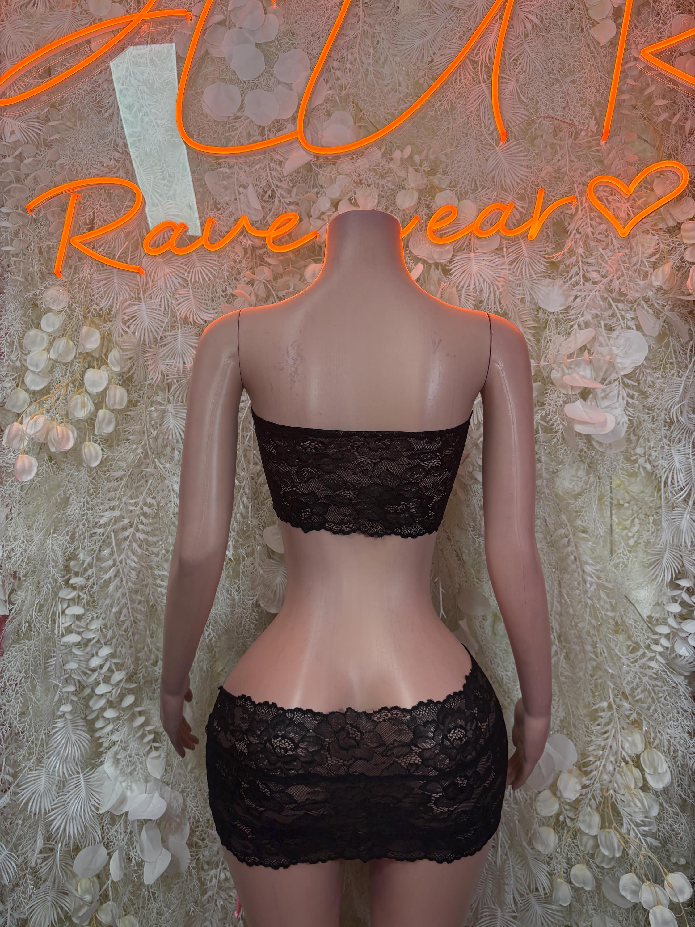 Black lace mini dress with lace back and ribbon tie details at the waist