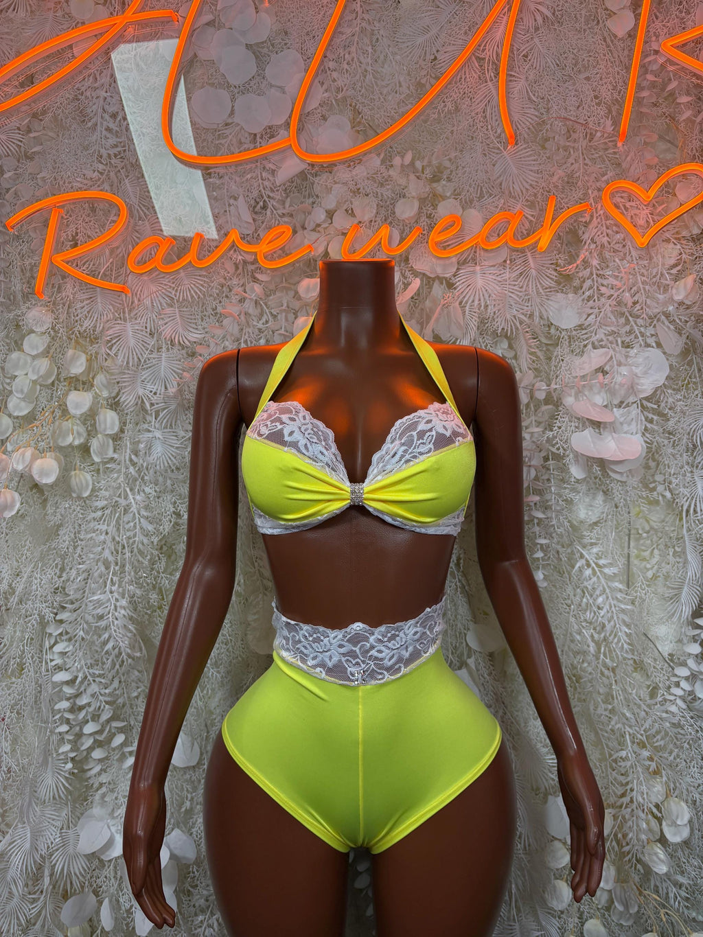 Neon lime green rave two-piece set with lace-trim triangle bra and high-waist bottoms