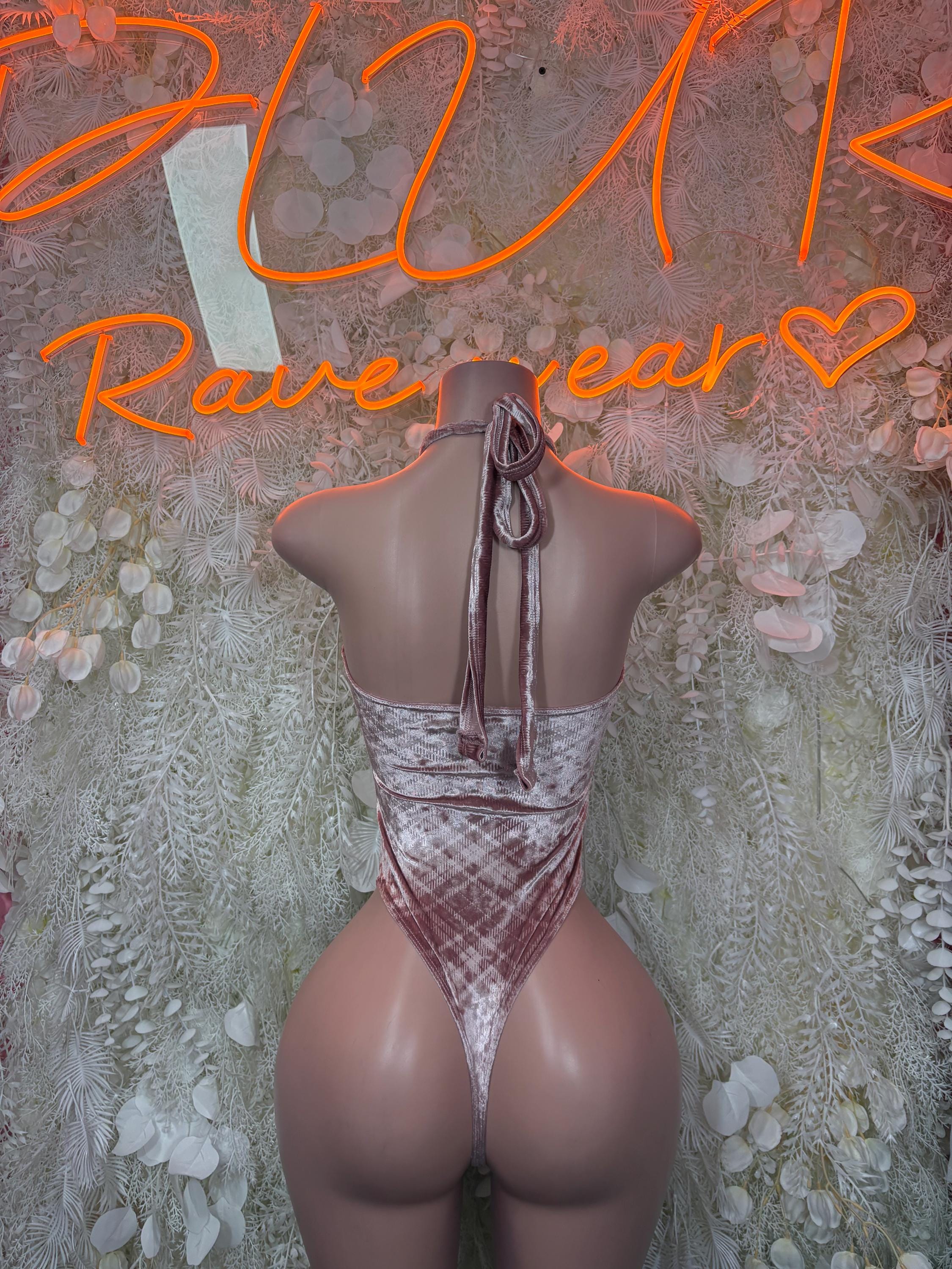 Silver shimmer halter bodysuit with lace-up open back and high-cut bottoms