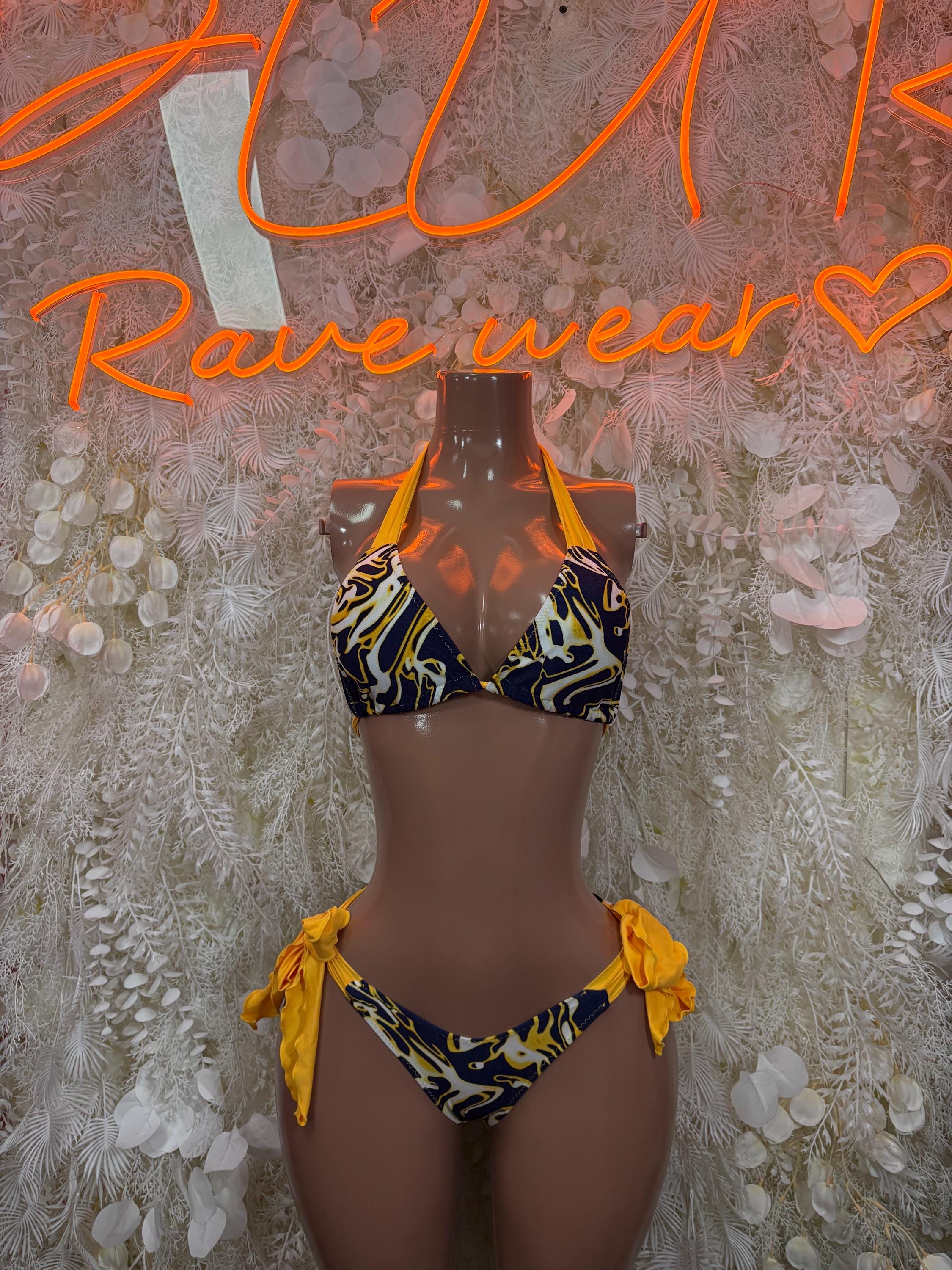 Blue and yellow patterned two-piece bikini with bow-tie shoulder straps
