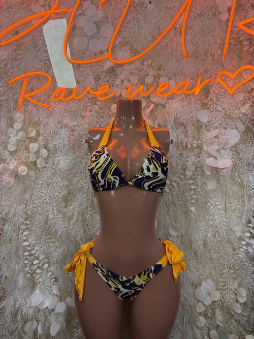 Blue and yellow patterned two-piece bikini with bow-tie shoulder straps