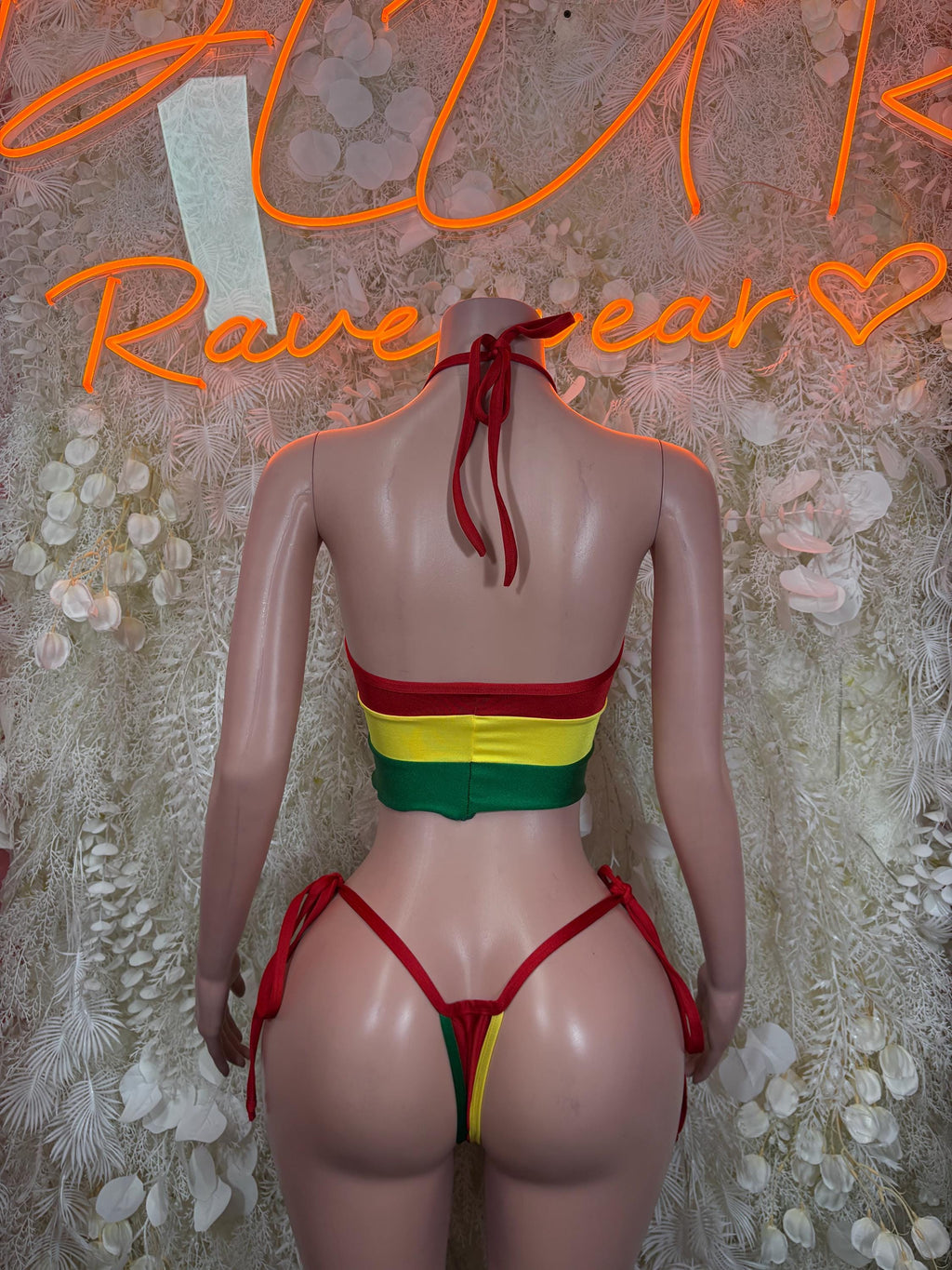 Back view red, yellow, green bikini crop top with striped band and tie bottoms