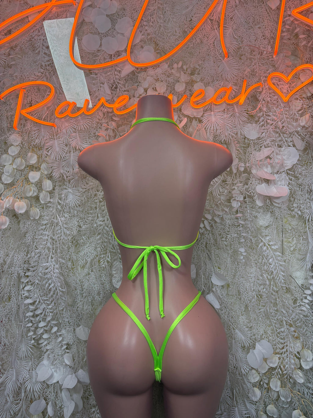 Neon green bikini set with triangle top and back tie string bottoms, back view
