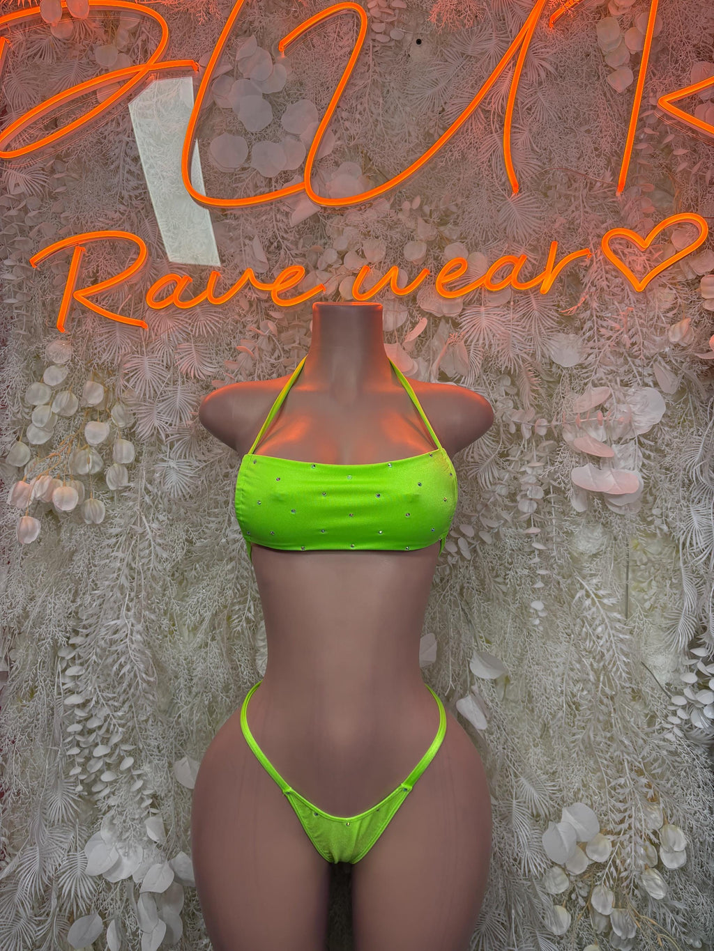 Neon green bikini set with triangle top and string bikini bottoms, front view
