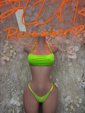Neon green bikini set with triangle top and string bikini bottoms, front view