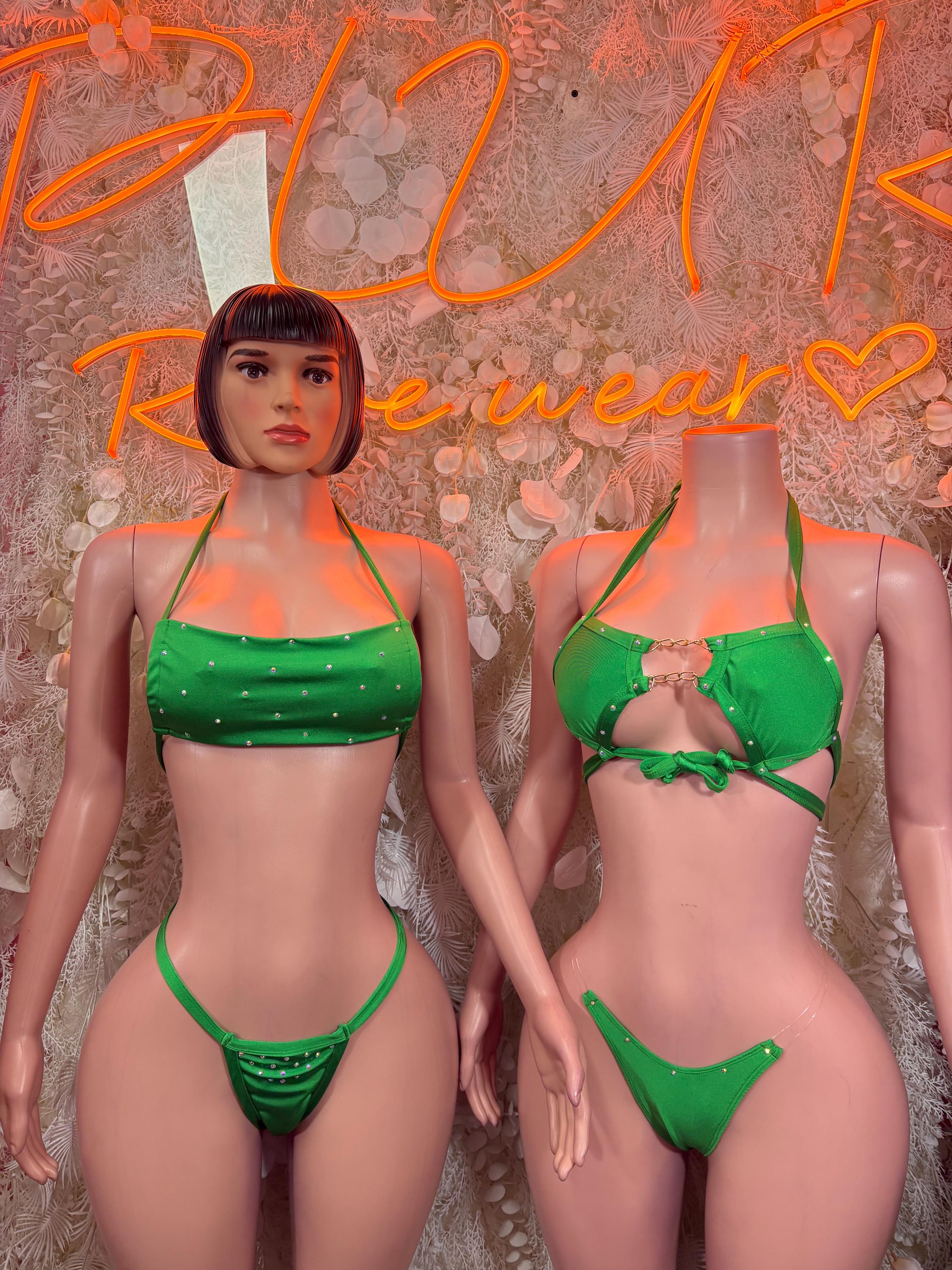 Green bikini two-piece set on two models, matching halter top and bottom, front