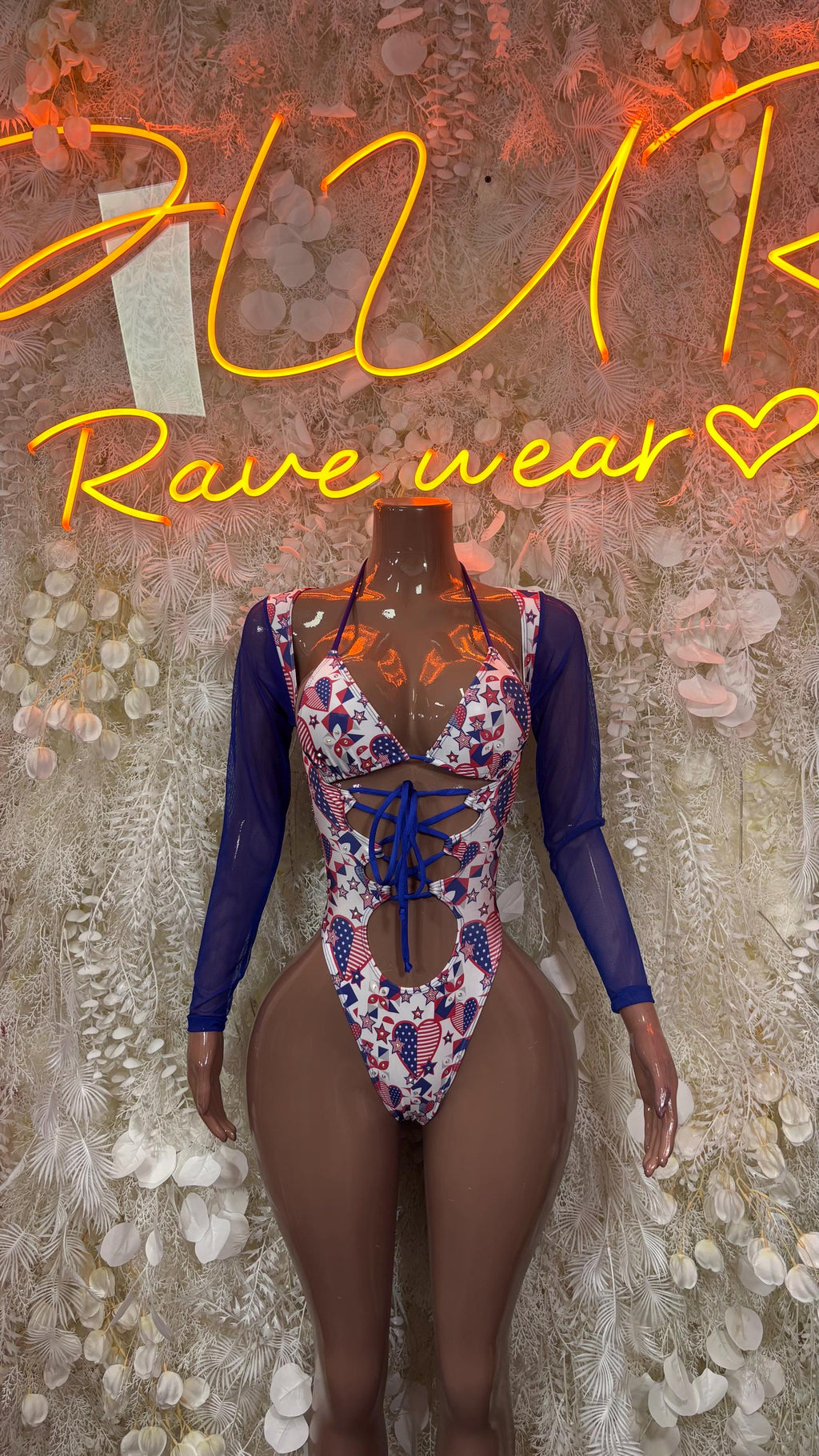Blue long-sleeve patriotic bodysuit with lace-up front and high-cut legs