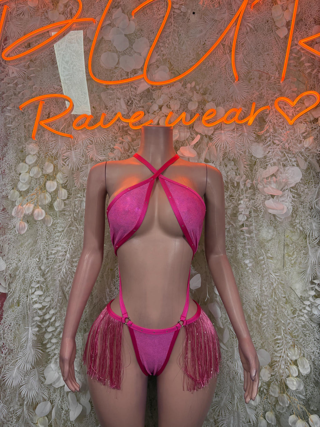 Pink fringe rave two-piece outfit with halter bikini top and matching tie-back bottoms