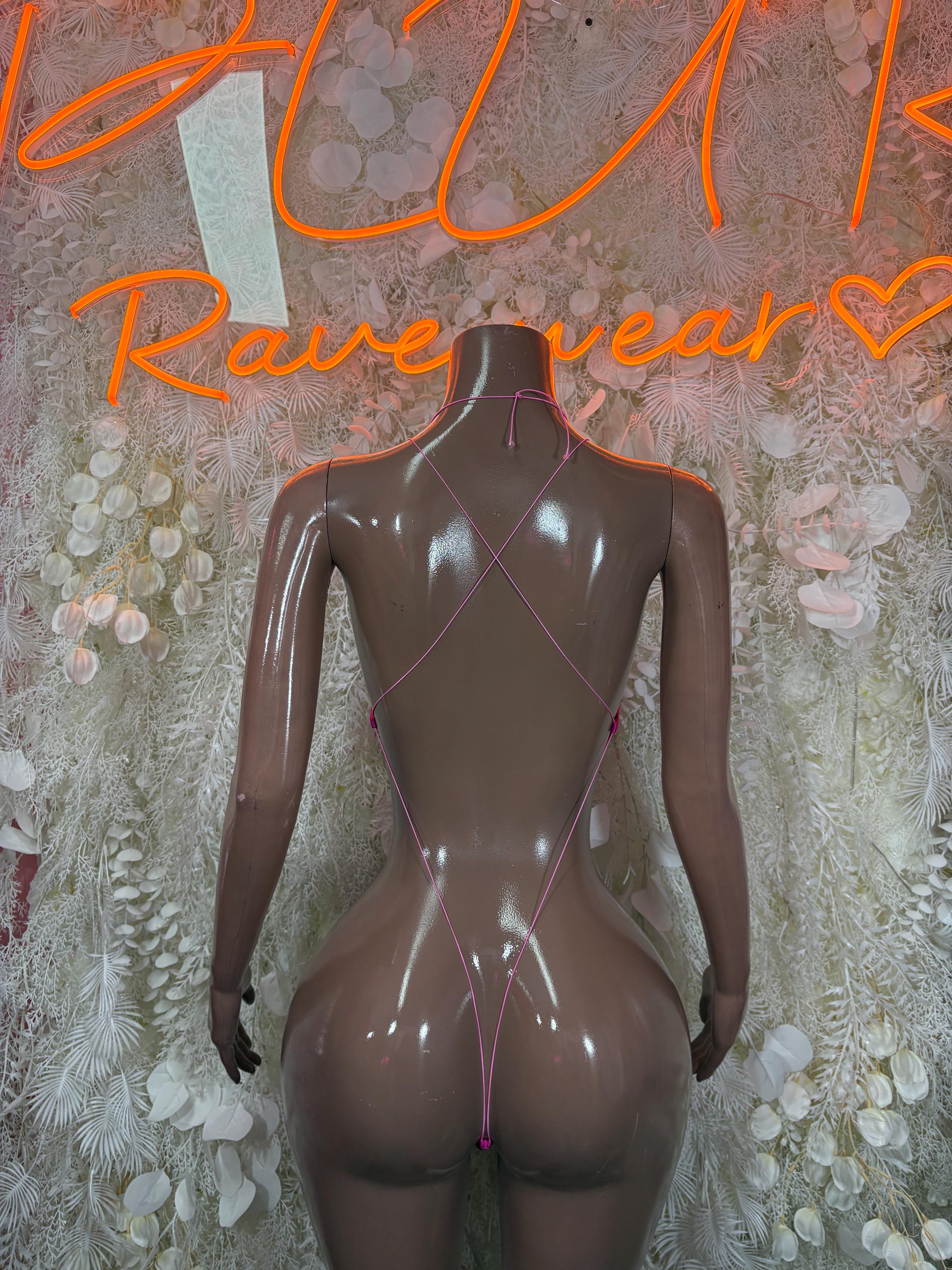 Pink rhinestone bodysuit with crisscross back and low neckline