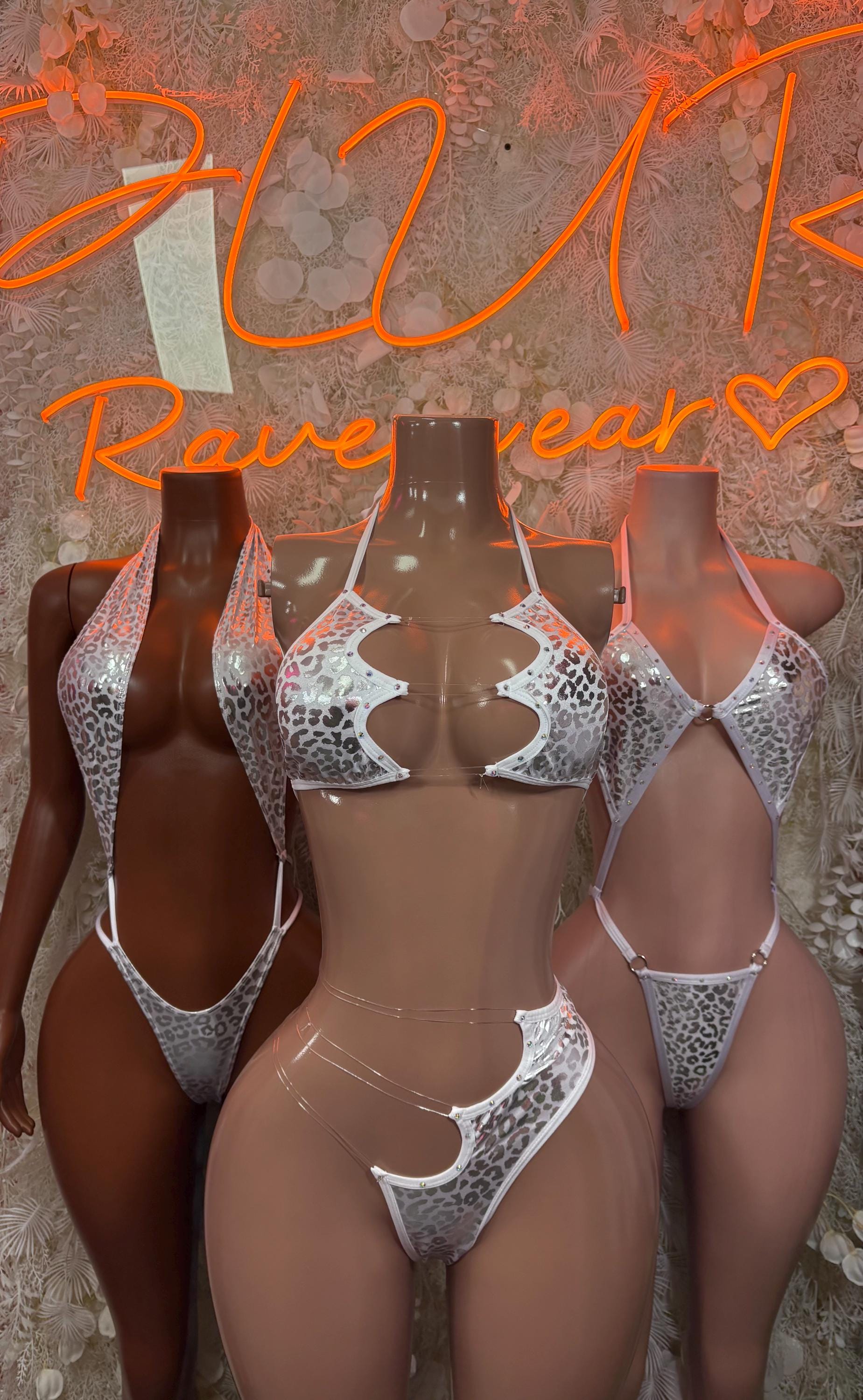 Silver cheetah print two-piece bikini set on mannequins, triangle bralette and briefs