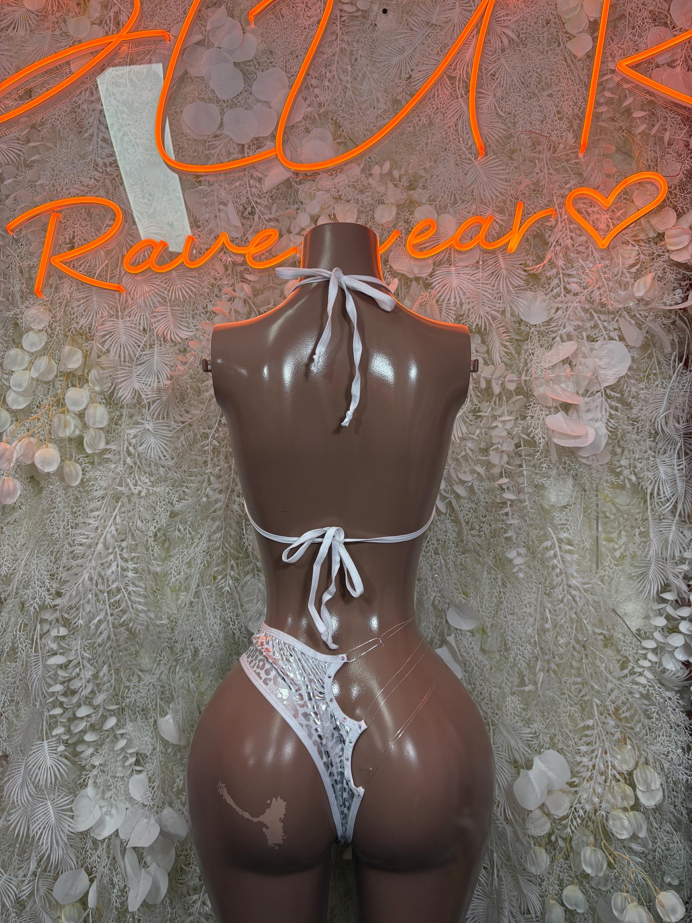 Silver cheetah print two-piece bikini with lace-up halter back and high-leg bottoms