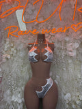 Silver hologram cheetah print two-piece bikini with cutout bra-style top and high-leg briefs