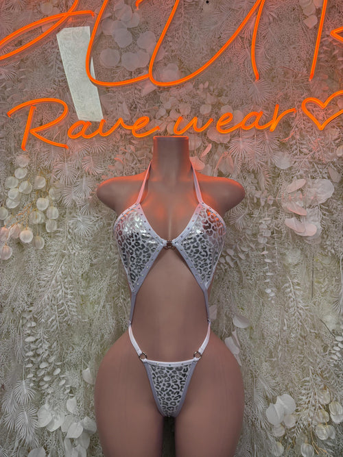Silver cheetah-print hologram bodysuit with thin straps and V-neck cut