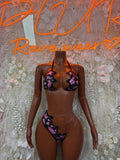 Pink and black cow-print strappy bikini set with high-cut bottom, front view
