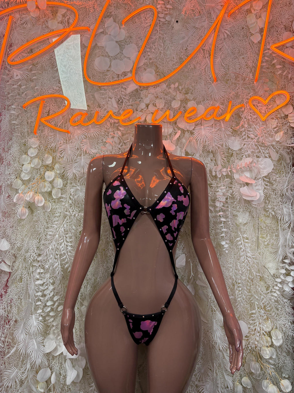 Cow-print lingerie set, pink-and-black halter bra with matching thong