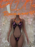Cow-print lingerie set, pink-and-black halter bra with matching thong