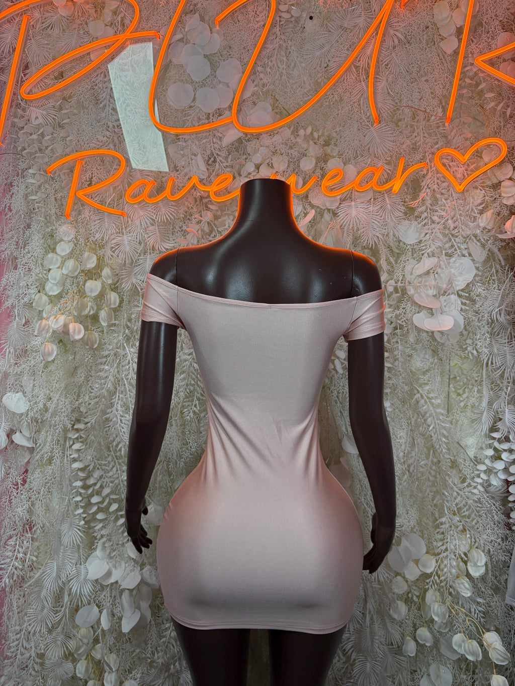 Light pink backless fitted mini dress with draped neckline and thin shoulder straps