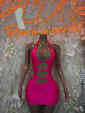 Hot pink fitted mini dress with cutout bust and sheer long sleeves on mannequin