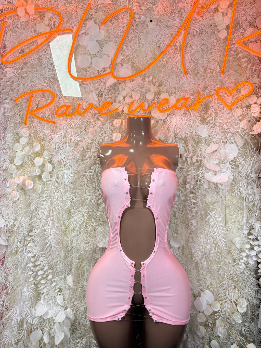 Light pink corset-style mini dress with front ruching and adjustable straps