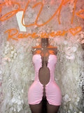 Light pink corset-style mini dress with front ruching and adjustable straps
