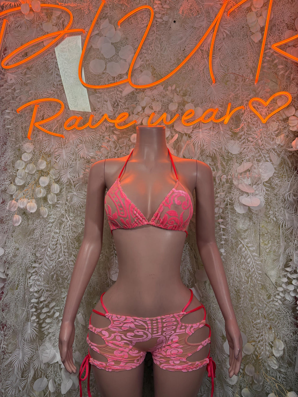 Coral two-piece bodysuit with lace bra top and matching drawstring shorts, front view