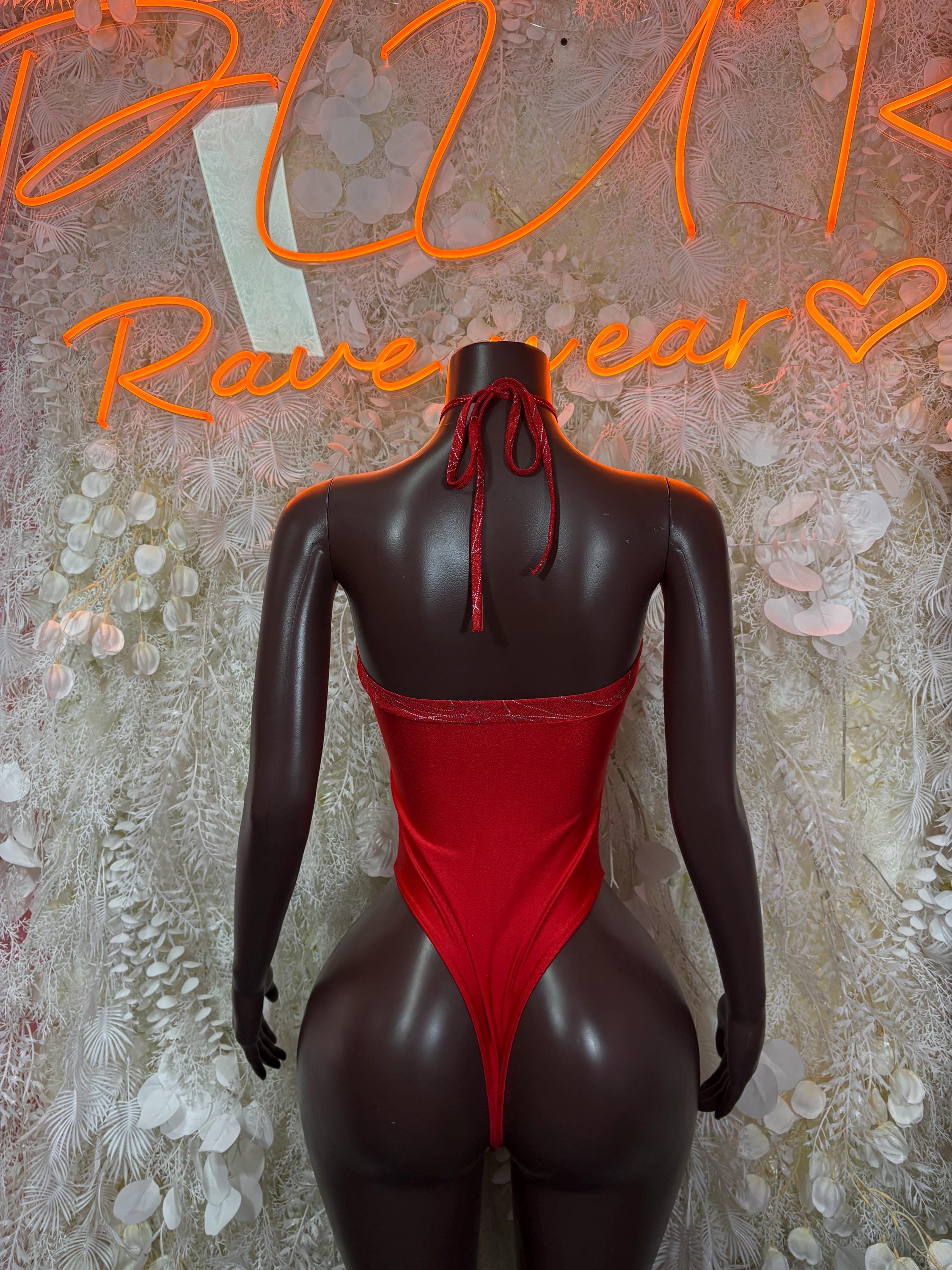 Back view red bodysuit with black sheer sleeves and halter tie at neck