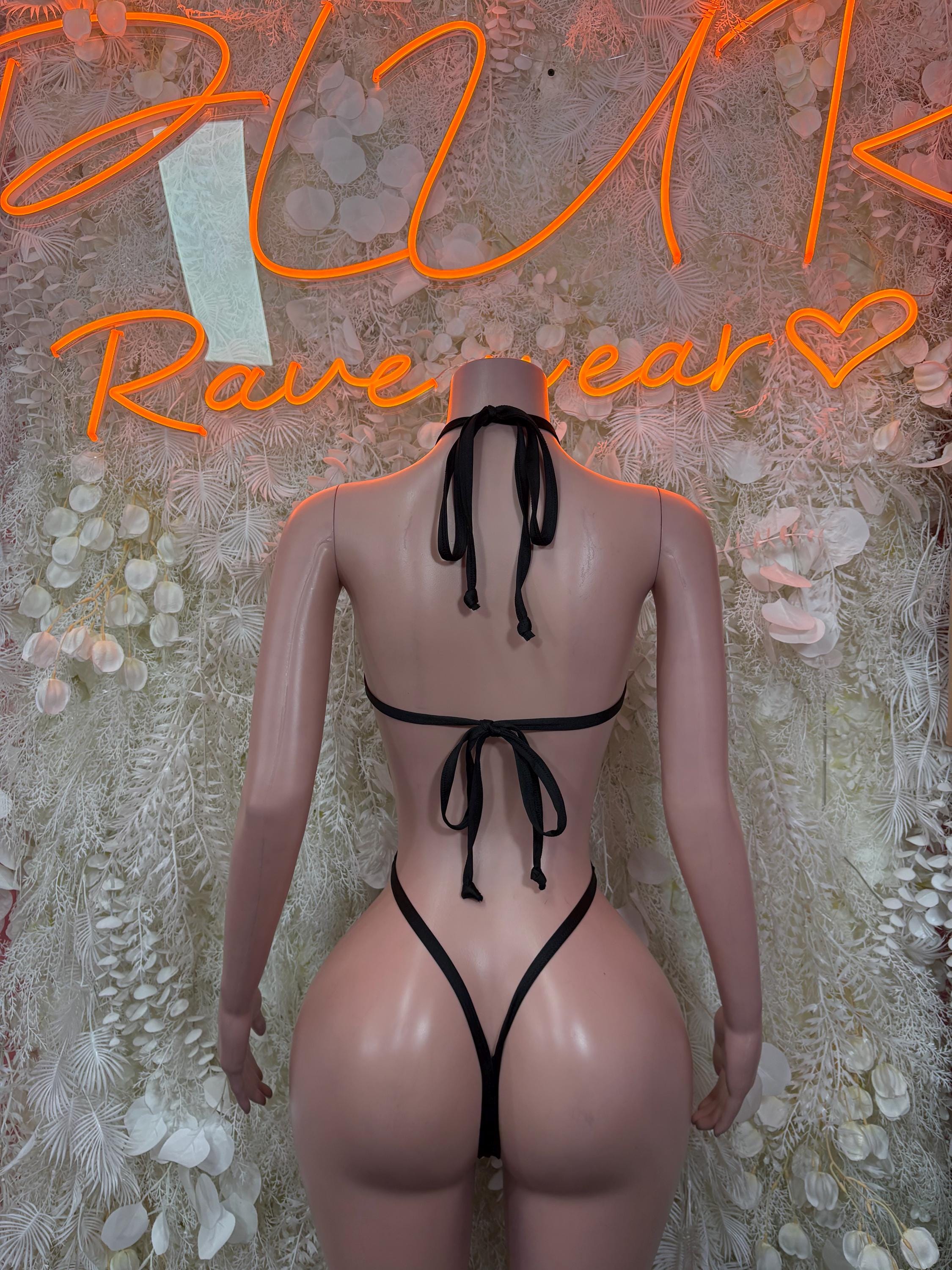 Black hologram cheetah dancewear set, back view with bow ties and thong bottom