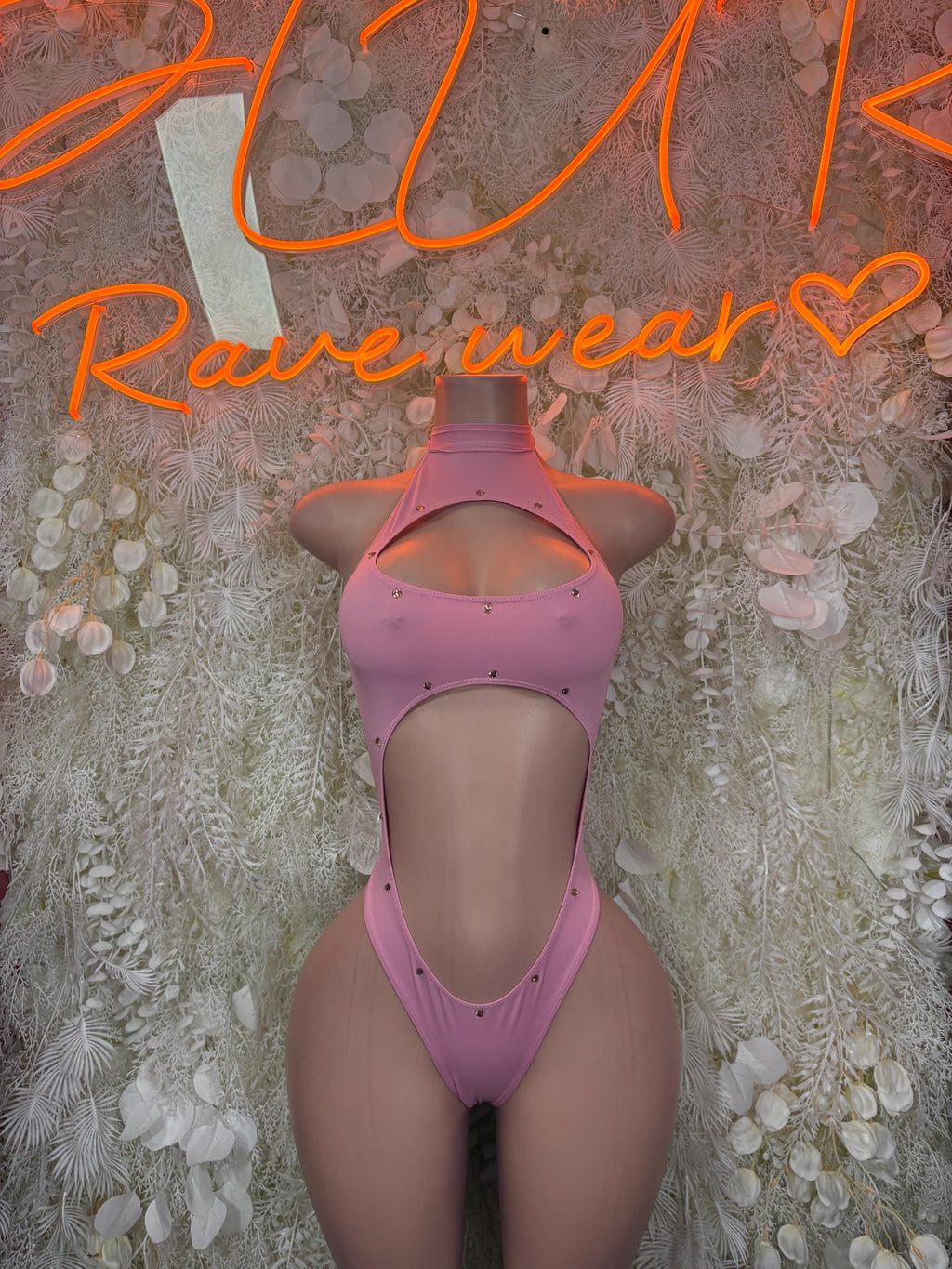 Pink halter cutout bodysuit with high neck, front cutout, minimal-coverage back