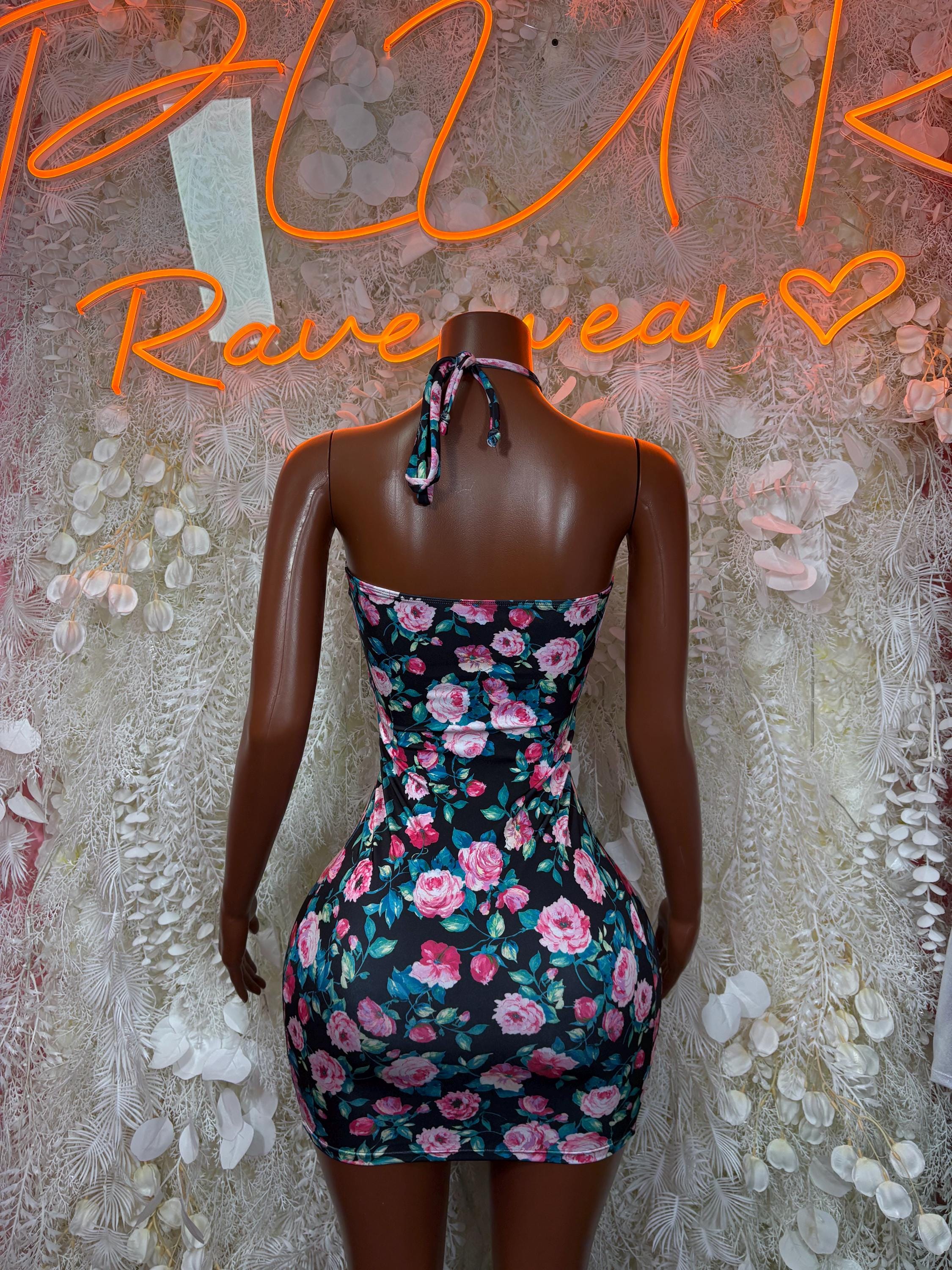 Floral blue halter mini dress with tie neck and ruched bodycon fit