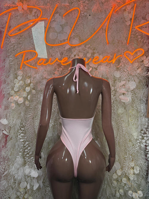 Light pink halter bodysuit with crisscross lace front and tie neck