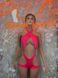 Pink halter bodysuit with halter tie and deep cutout front, thong-style bottom