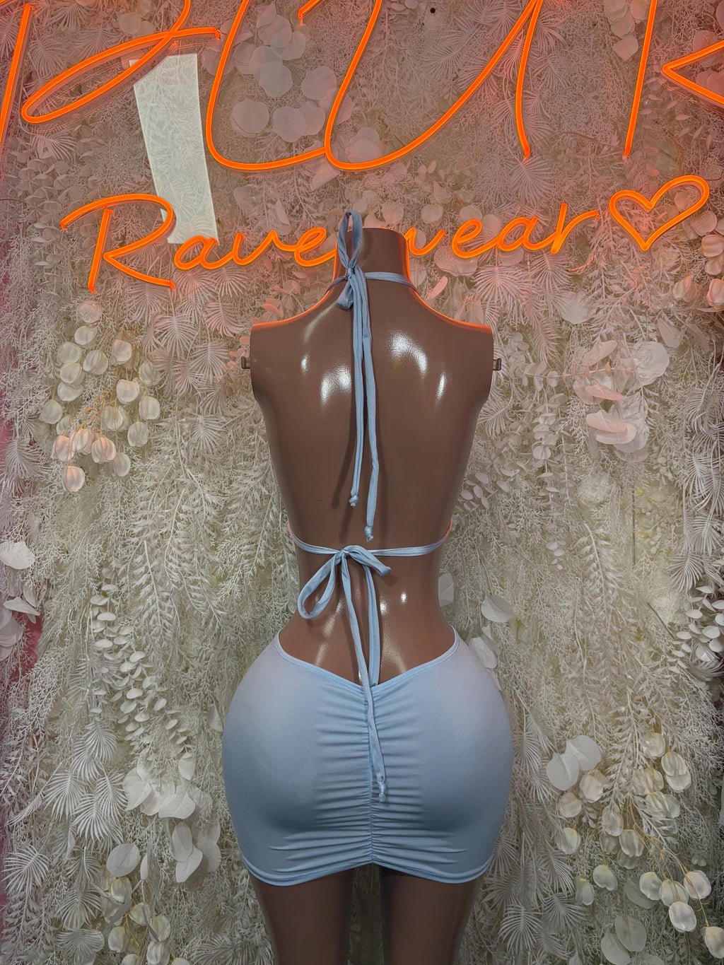 Light blue backless halter mini dress with tied straps and ruched front