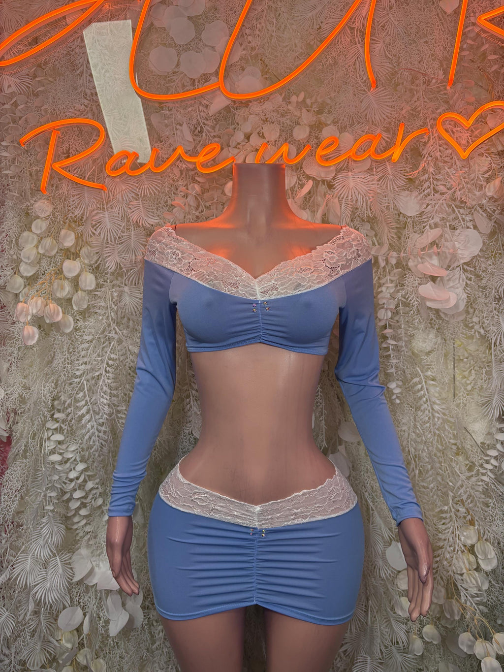 Blue long-sleeve festival two-piece outfit with lace-trim crop top and mini skirt