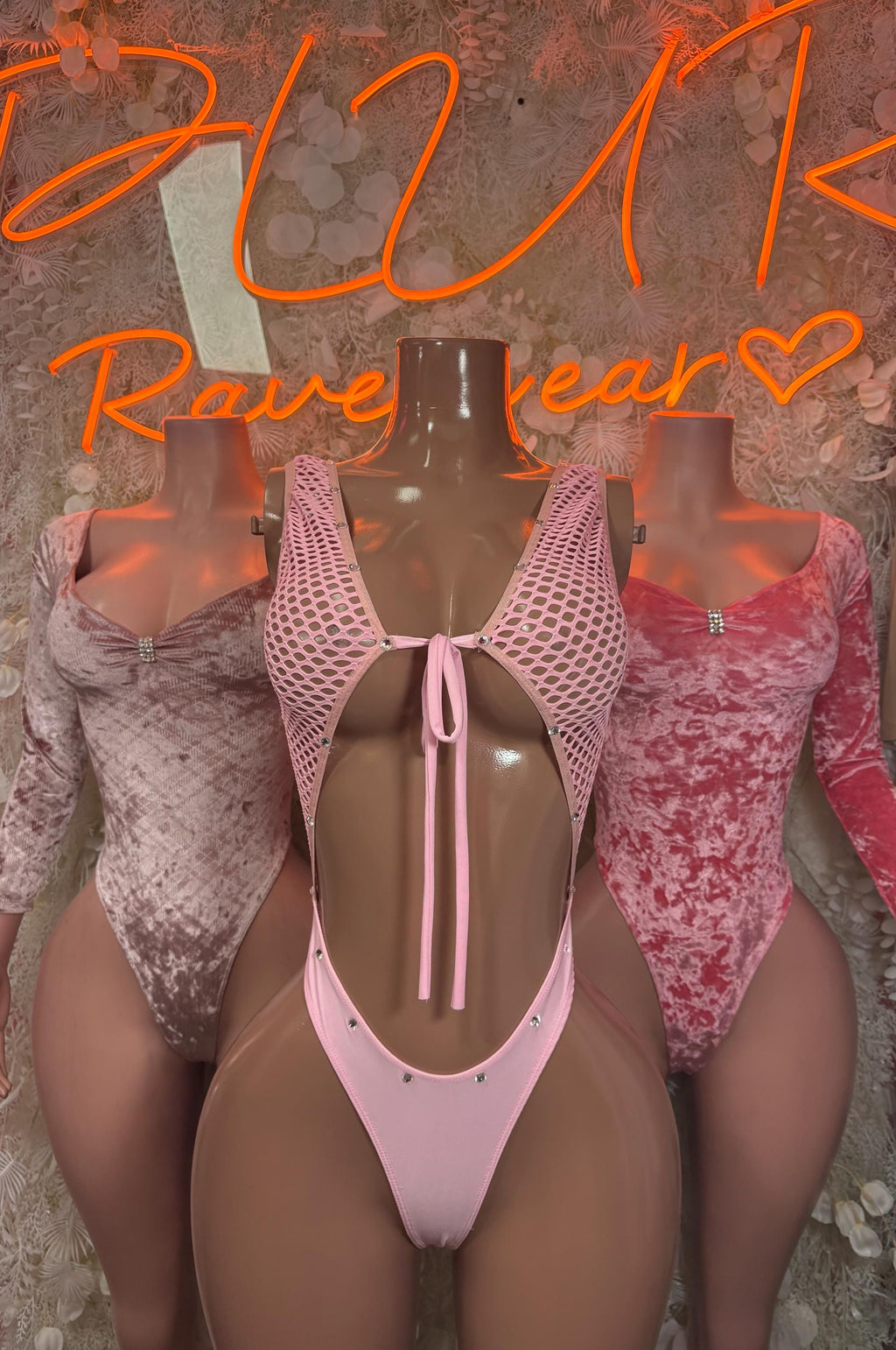 Velvet bodysuit with mesh panels, sweetheart neckline, and back bow tie
